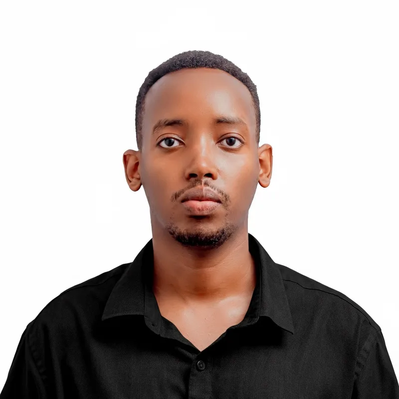 Frank Shema wearing a black collared shirt
